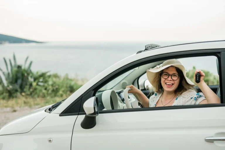 Smiling expat lady just got her drivers license in Panama